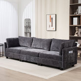 Ultra-soft dark grey XXXL chenille 3-seater sofa with flared arms, pillow back cushions, and side pocket for storage in a modern living room setting