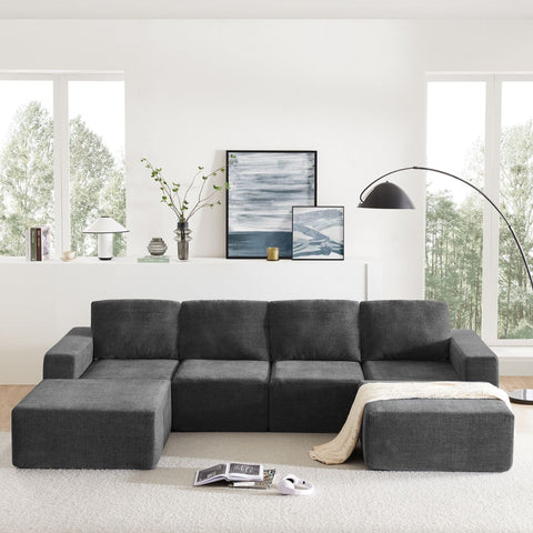 Dark gray luxury modular U-shaped sectional sofa with ottomans in modern living room