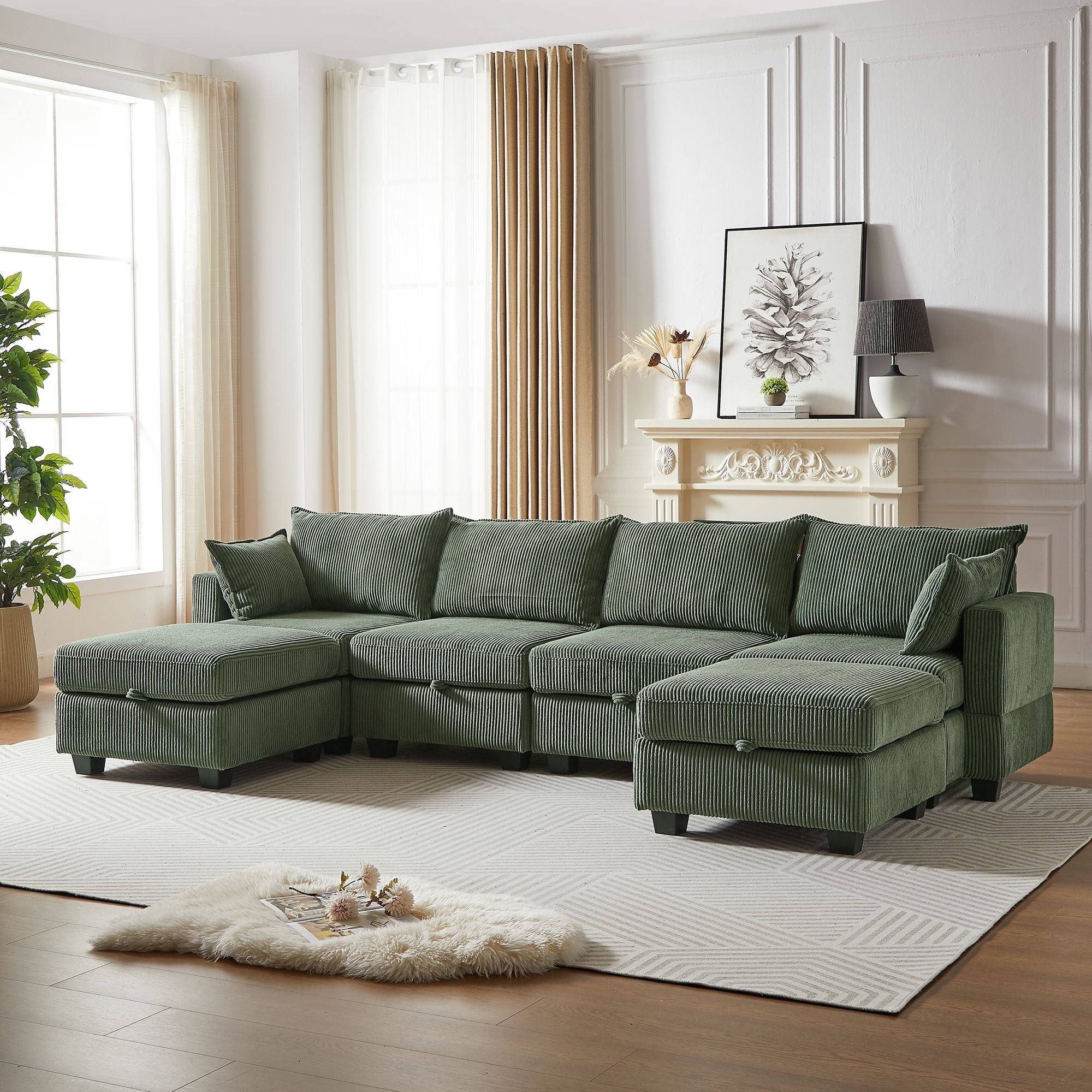 Green corduroy modular sectional sofa with chaise and storage ottoman in a bright living room