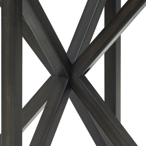 close-up of black solid wood base with intersecting modern simple glass coffee table legs