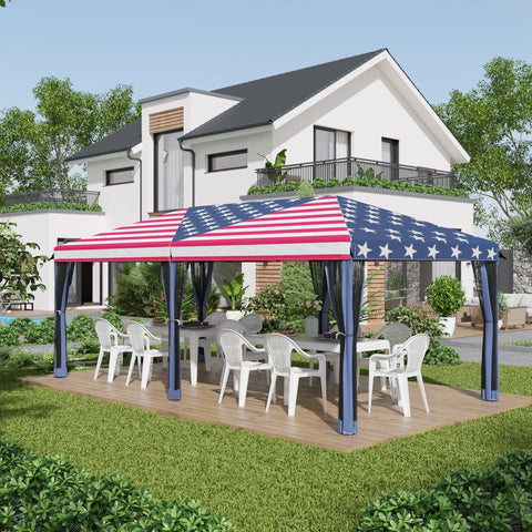 Patriotic 10x20 pop-up canopy tent with American flag design, mesh sidewalls, and sturdy steel frame set up outdoors with white chairs and table.