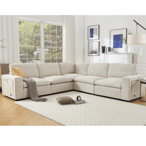 Beige L-shaped modular sectional couch for living room with soft linen fabric, wireless charging ports, cup holders, and book storage compartments, seating 5 people.