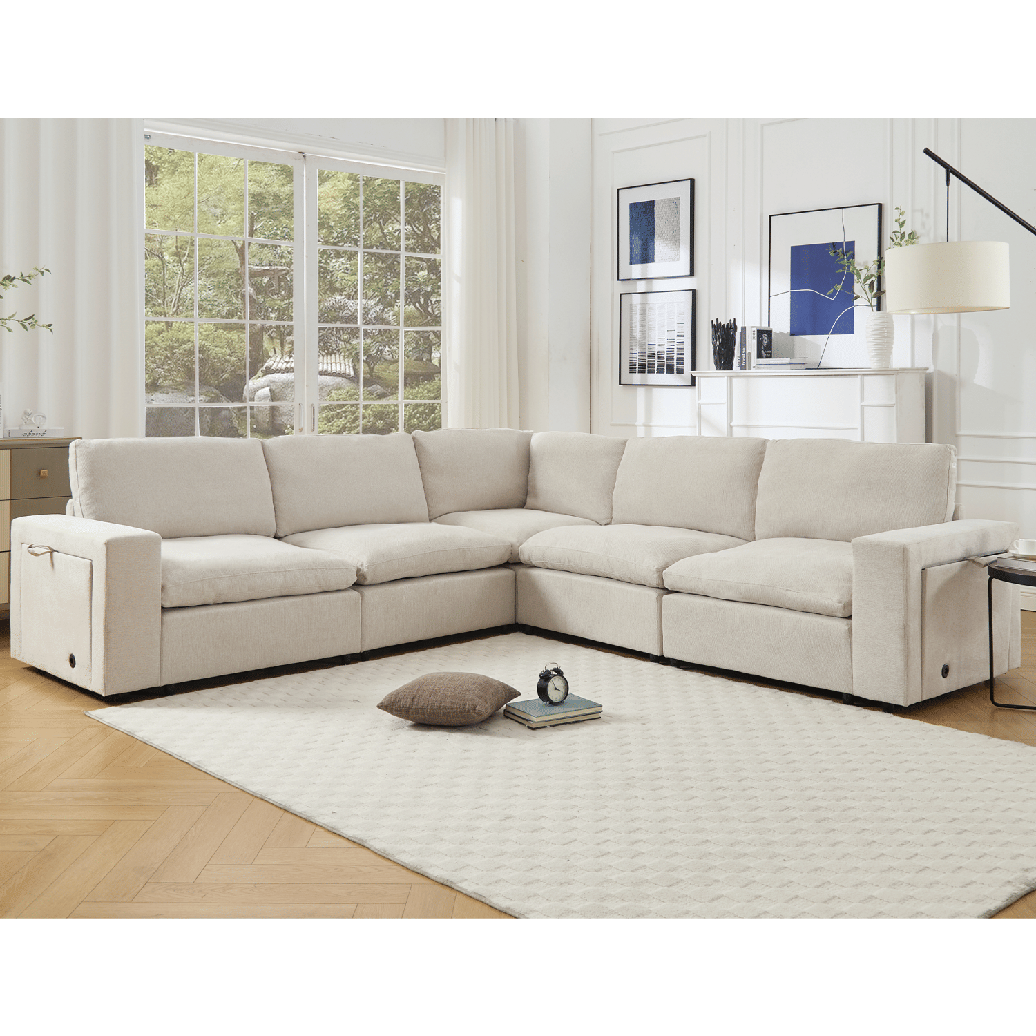 Beige sectional couch for living room with soft linen fabric, L-shaped modular design, wireless charging ports, cup holders, and book storage space.