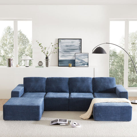 Navy modular U-shape chenille sofa with ottomans in modern living room setting