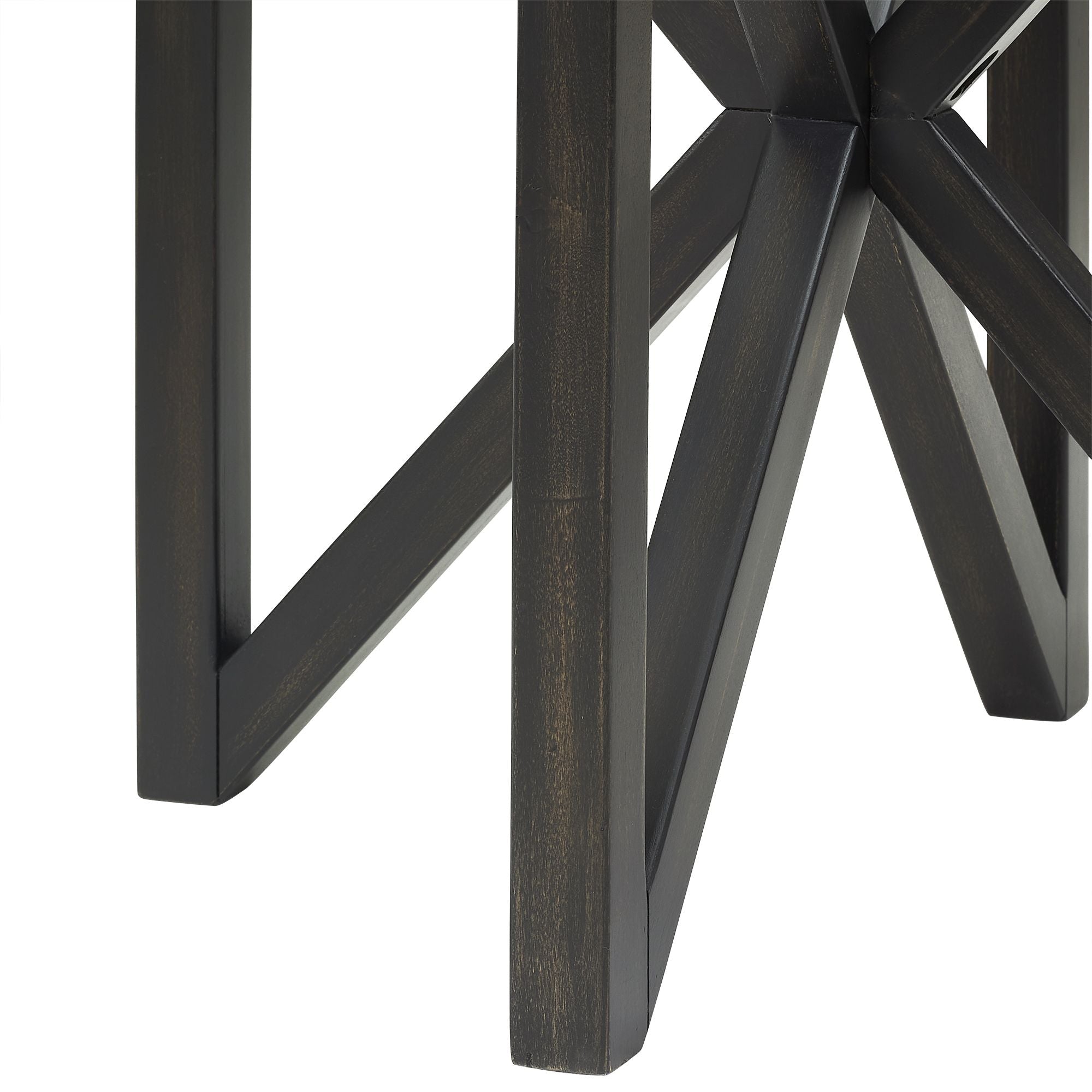 close-up of black solid wood base of modern simple glass coffee table