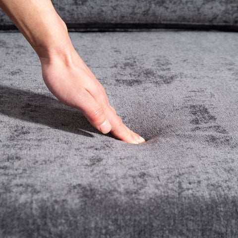 Ultra-soft dark grey chenille fabric on XXXL 3-seater sofa cushion showing plush comfort and indentation.