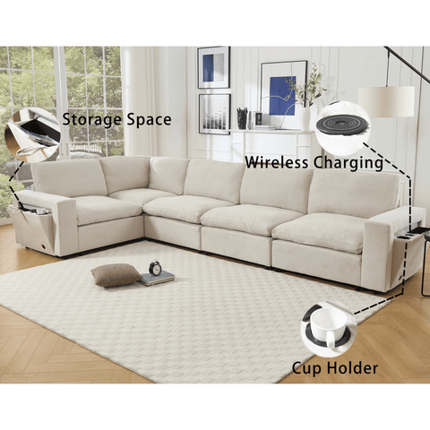 Beige modular sectional couch for living room with L-shaped design, wireless charging ports, cup holders, book storage space, and soft linen fabric upholstery.