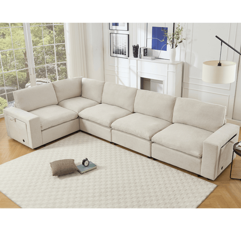 Beige 5-seat modular sectional couch for living room with soft linen fabric, wireless charging ports, cup holders, and built-in book storage space.